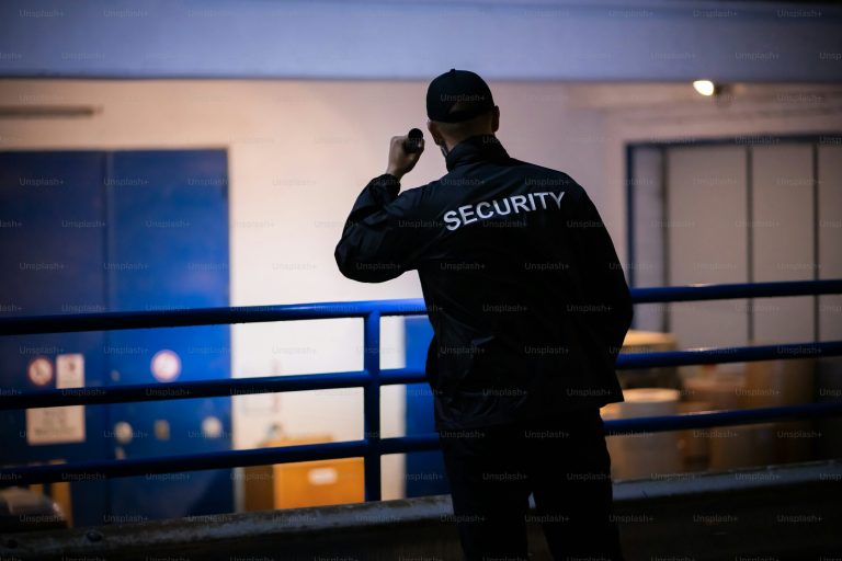 Professional security guard in uniform providing certified security services in Malaysia by Titan Force